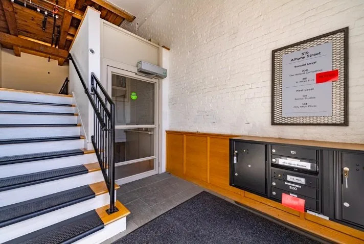 Entry stair and mailroom in a converted commercial building
