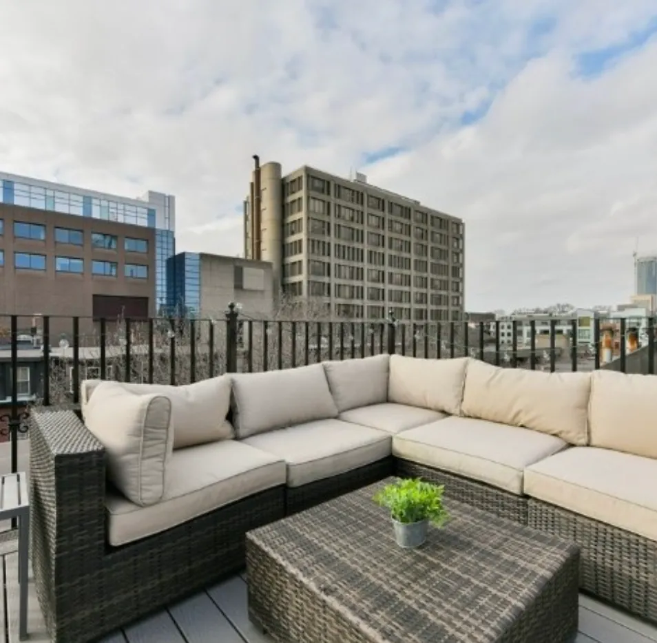 Roof deck seating area at East Brookline Street